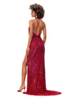 Back. Red ASHLEYlauren 11341 stunning hand-beaded gown featuring a deep V-neckline halter top, intricate bead pattern, fringe accents, an open back, and a left leg slit for a bold and glamorous look.