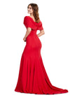 Back. Red ASHLEYlauren 11412 elegant scuba gown featuring an off shoulder bustier, oversized bow detail, and a left leg slit for a sophisticated and statement-making look.