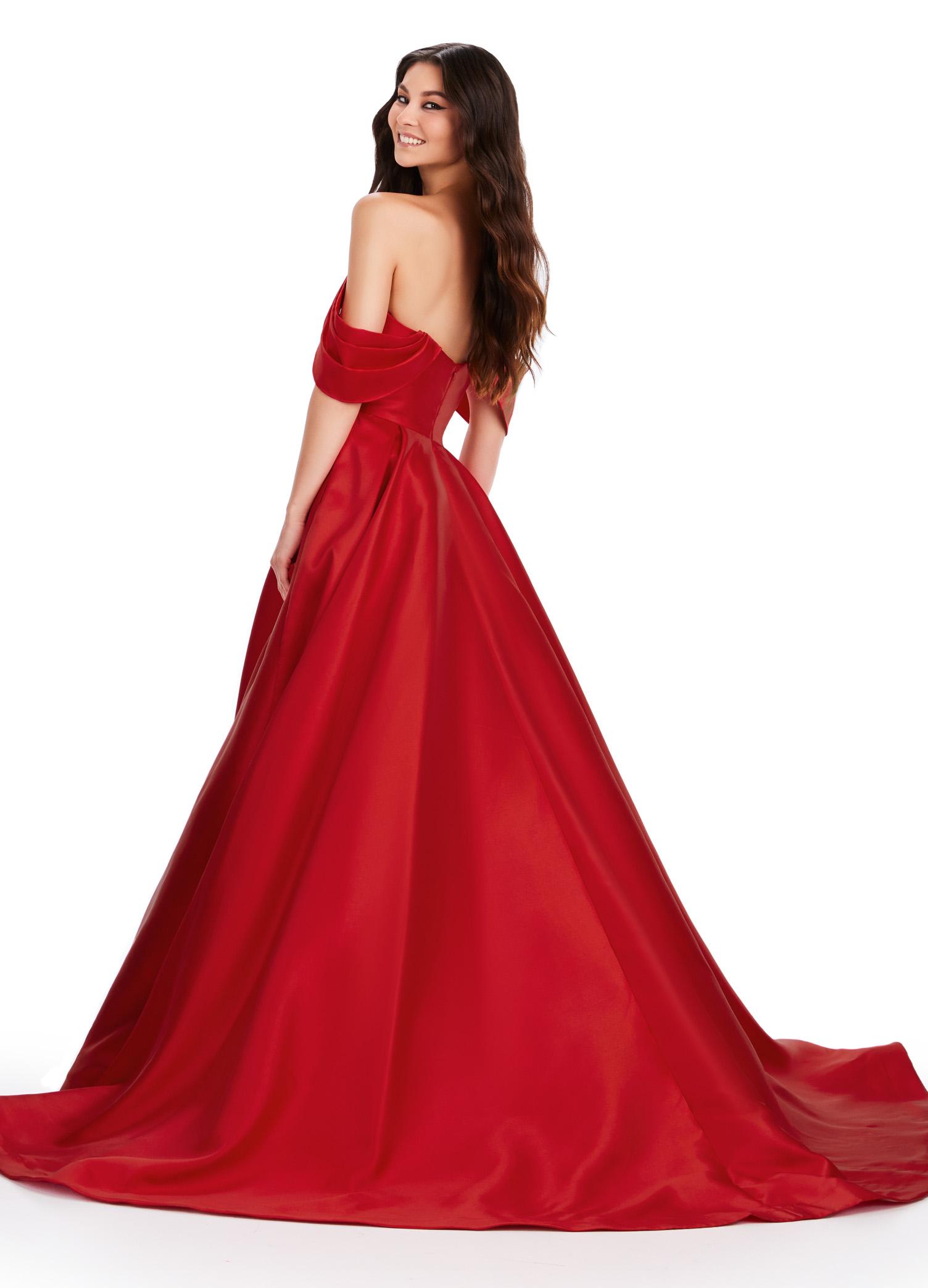 Back. Red ASHLEYlauren 11544 elegant Mikado ball gown featuring a pleated off shoulder detail and a full ball gown skirt for a timeless and sophisticated look.