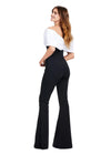 Back. White/Black ASHLEYlauren 11414 chic scuba jumpsuit featuring an off shoulder neckline with an oversized bow for a bold and sophisticated statement look.