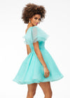 Back - Aqua ASHLEYlauren 4524 organza cocktail dress featuring a one shoulder neckline with a flutter sleeve, an A-line skirt with a wire hem for added structure, and a playful, sassy vibe.