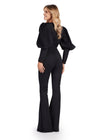 Back - Black ASHLEYlauren 11533 scuba jumpsuit featuring a V-neckline, dramatic bishop puff sleeves, and a sleek, tailored fit for a bold and sophisticated look.