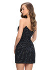 Back - Black ASHLEYlauren 4500 strapless gown featuring a plunging V-neckline, ornate sequin bead pattern, and striking V-back for a bold and glamorous look.