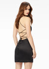 Back - Black ASHLEYlauren 4513 satin cocktail dress featuring spaghetti straps, an exquisitely draped bodice, wrap fitted skirt with a left leg slit, and an open lace-up back for an elegant and sophisticated look.