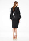Back - Black ASHLEYlauren 4545 elegant scuba cocktail dress featuring a scoop neckline, bishop sleeves embellished with scattered crystals and feathers, a fitted tea-length skirt, and a full zipper back for a sophisticated finish.