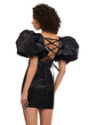 Back - Black ASHLEYlauren 4549 cocktail dress featuring a V-neckline, oversized puff sleeves, heat set stone-embellished waistband, fitted skirt, and center lace-up back for a bold and glamorous look.