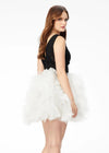 Back - Black/white ASHLEYlauren 4546 A-line cocktail dress featuring a V-neckline, ruched bustier with scattered embellishments, and a layered ruffle tulle skirt for a sweet and statement-making look.