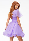 Back - Lilac ASHLEYlauren 4524 organza cocktail dress featuring a one shoulder neckline with a flutter sleeve, an A-line skirt with a wire hem for added structure, and a playful, sassy vibe.