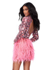 Back - Pink ASHLEYlauren 4673 fitted cocktail dress featuring long sleeves, intricate mirror beadwork, an open back, and a feathered skirt for a show-stopping and glamorous look.