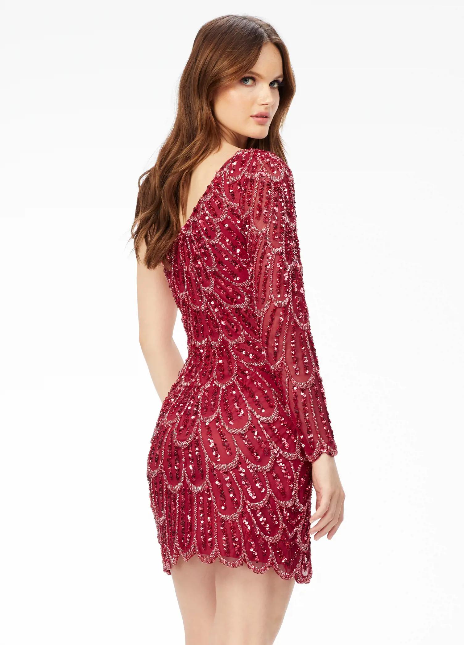 Back - Red ASHLEYlauren 4498 fitted one shoulder cocktail dress featuring an intricate peacock-inspired sequin bead pattern, single sleeve, and a front left leg slit for a bold and elegant look.