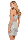 Back - Silver ASHLEYlauren 4595 fitted sequin cocktail dress featuring a one shoulder neckline, illusion shark bite cut-out along the waistline, corset details, and dramatic crystal fringe for a bold and show-stopping look.