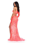 Back view. ASHLEYlauren 11442 coral one shoulder sequin gown with open back and thigh-high slit