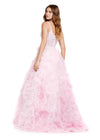 Back view. ASHLEYlauren 11446 blush pink tulle gown with ruffled A-line skirt, corset bustier, deep illusion V-neckline, and leg slit
