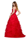 Back view. ASHLEYlauren 11446 red tulle gown with ruffled A-line skirt, corset bustier, deep illusion V-neckline, and leg slit
