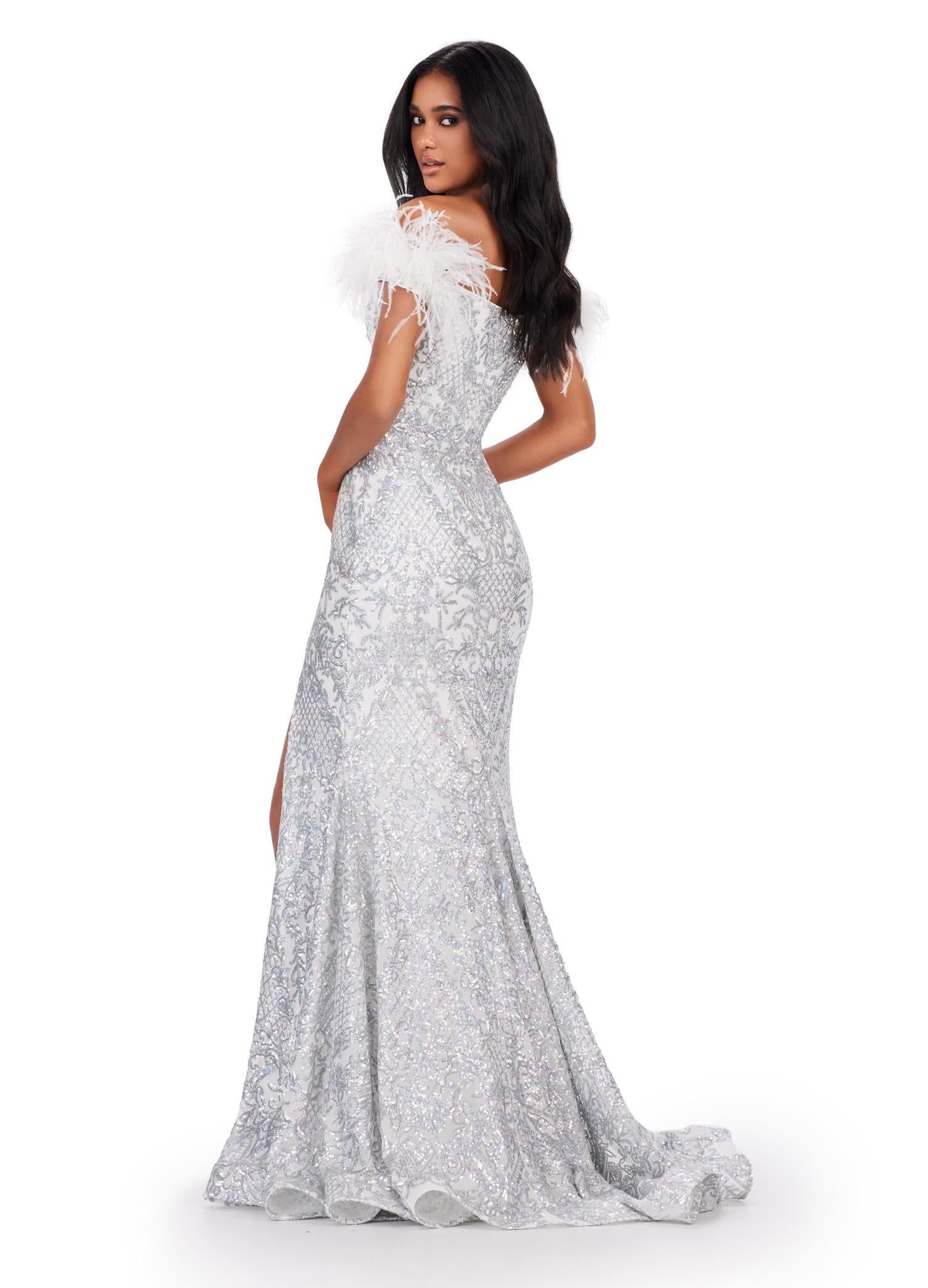 Back view. ASHLEYlauren 11463 Silver/Ivory sequin gown with sweetheart neckline, feather off shoulder straps, and left leg slit
