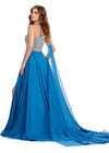 Back view. ASHLEYlauren 11482 peacock one shoulder gown with fully beaded bodice, chiffon cape, A-line skirt, and leg slit