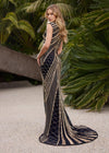 Back view. ASHLEYlauren 1674 black and gold fully beaded gown with high neck, cap sleeves, centre slit, and geometric detailing