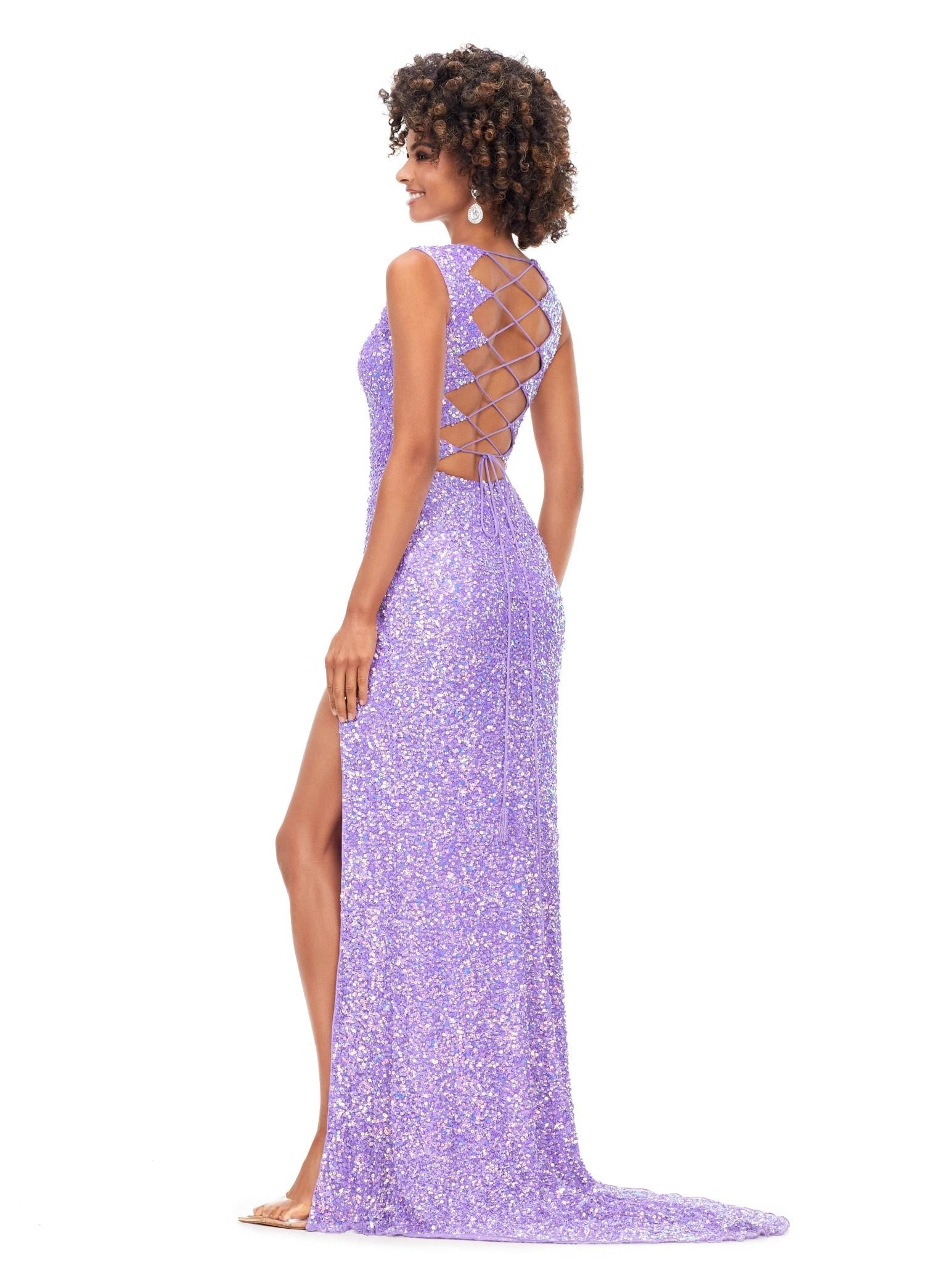 Back view. Ab/Orchid ASHLEYlauren 11373 stunning fitted gown featuring a deep V-neckline, lace-up open back, fully hand-beaded design, and a left leg slit, available in vibrant colors for a bold and head-turning look.