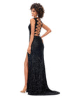 Back view. Black ASHLEYlauren 11373 stunning fitted gown featuring a deep V-neckline, lace-up open back, fully hand-beaded design, and a left leg slit, available in vibrant colors for a bold and head-turning look.