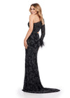 Back view. Black ASHLEYlauren 11649 One Shoulder Fully Beaded Gown with Intricate Beading, Side Cut Out, Feather Cuff Detail, Left Leg Slit, and Sweep Train