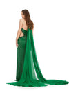 Back view. Emerald ASHLEYlauren 11399 stunning gown featuring a halter neckline, intricate liquid beading, crystal-accented illusion cut outs, and a dramatic chiffon cape for a glamorous and show-stopping look.
