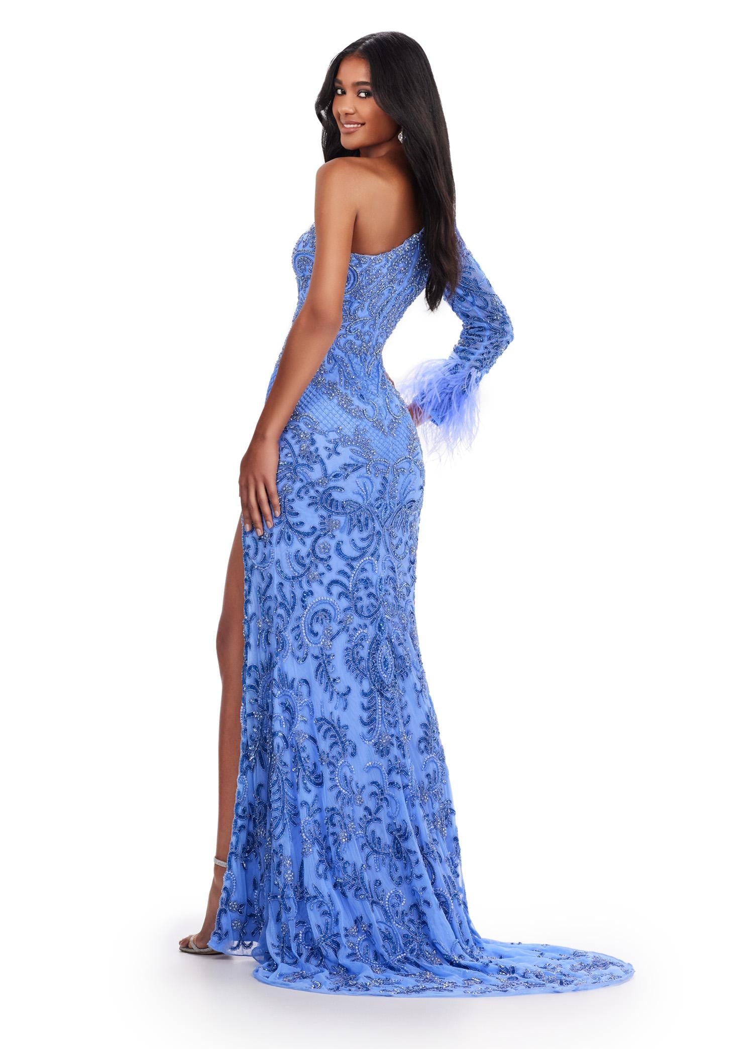 Back view. Periwinkle ASHLEYlauren 11649 One Shoulder Fully Beaded Gown with Intricate Beading, Side Cut Out, Feather Cuff Detail, Left Leg Slit, and Sweep Train