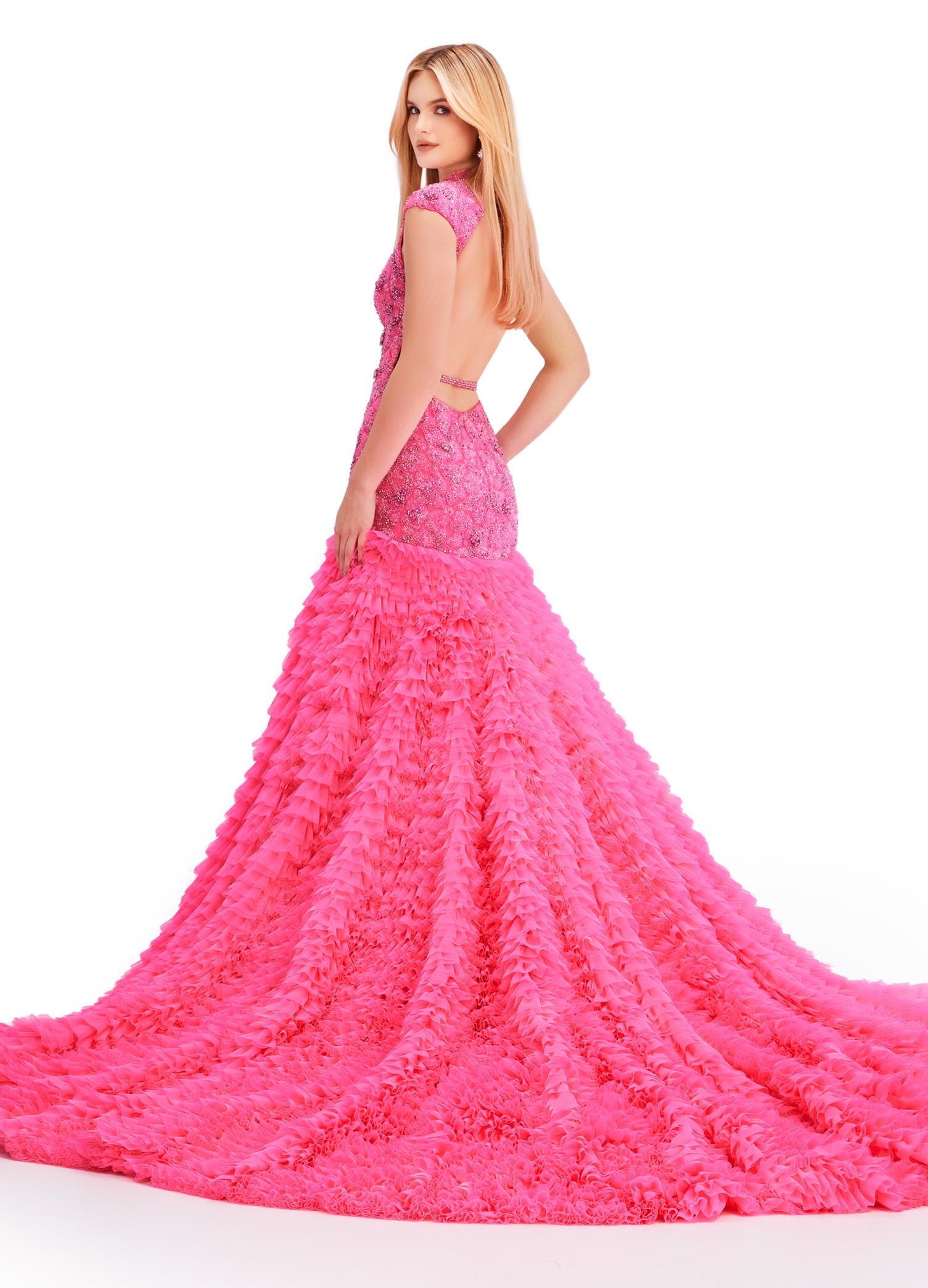 Back view. Pink ASHLEYlauren 11428 breathtaking mermaid gown featuring a fully beaded drop waist bustier, open back, cap sleeves, and a dramatic tiered ruffle tulle skirt for an unforgettable look.