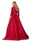 Back view. Red ASHLEYlauren 11326 Elegant Phantom Satin Ball Gown with V-Neckline, Wrap Lapel Detail, Buckled Waist Belt, Full Skirt, and Hidden Pockets