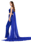 Back view. Royal ASHLEYlauren 11385 statement two-piece jumpsuit featuring an intricately hand-beaded bustier and pants, a matching beaded choker, and a dramatic chiffon cape for a bold and fashion-forward look.