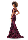 Back view. Ruby Red ASHLEYlauren 11330 elegant off shoulder velvet sequin gown featuring a signature criss-cross back, a fitted silhouette, horsehair hem, and a sweep train for a sophisticated and glamorous look.