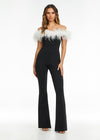 ASHLEYlauren 11100 – A flirty off-shoulder scuba jumpsuit featuring feather details along the neckline and flare pant legs. Perfect for making a stylish statement at your next event.