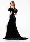 Back - Black ASHLEYlauren 11217 – A magnificent off-shoulder velvet gown featuring oversized ruffle details, a contour seamed skirt with a left leg slit, and a dramatic train. Perfect for making a bold, elegant statement at any event.