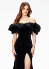 Black ASHLEYlauren 11217 – A magnificent off-shoulder velvet gown featuring oversized ruffle details, a contour seamed skirt with a left leg slit, and a dramatic train. Perfect for making a bold, elegant statement at any event.