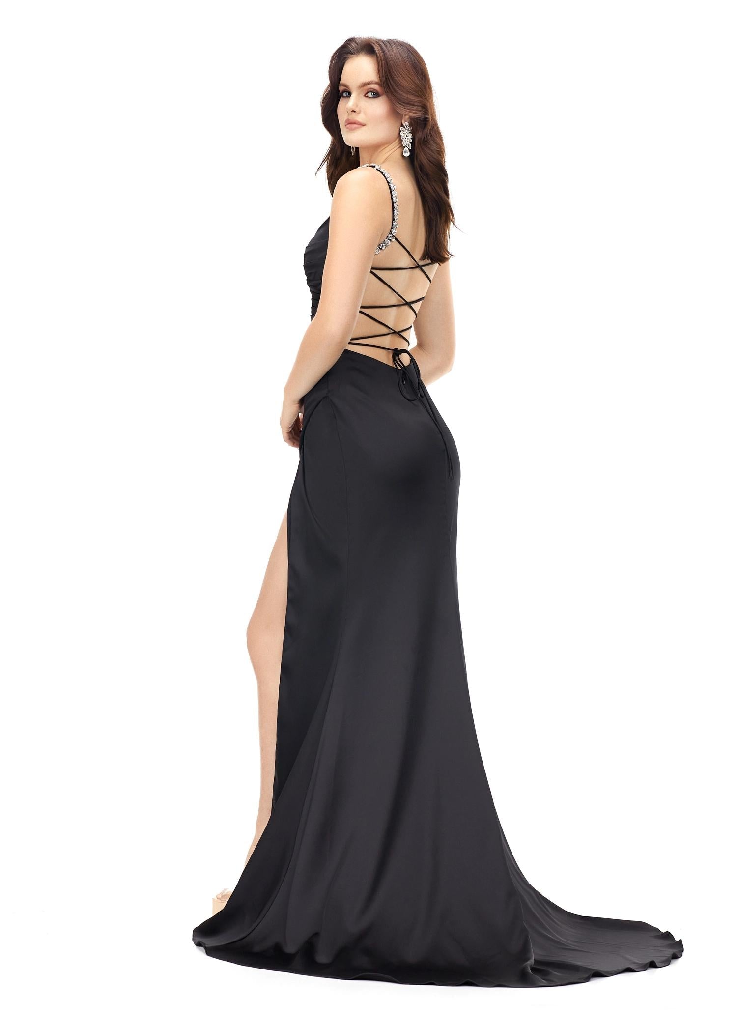 Black ASHLEYlauren 11298 satin gown featuring a modified sweetheart neckline with crystal trim, ruched bodice, wrap skirt with left leg slit, and lace-up back. Back
