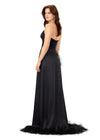Back - Black ASHLEYlauren 11313 strapless satin gown featuring a ruched bustier, slight A-line skirt, high right leg slit, and cascading feather trim along the hemline.