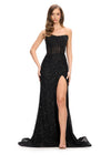 Black ASHLEYlauren 11659 fully beaded gown featuring a strapless corset bustier, asymmetrical waistline to accentuate curves, fitted silhouette, left leg slit, and horsehair trim for an elegant and glamorous look.