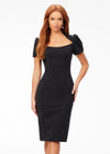 Black ASHLEYlauren 4534 scuba cocktail dress featuring a modified square neckline, dramatic puff sleeves, fitted tea-length skirt, and full zipper back for a sophisticated and stylish look.
