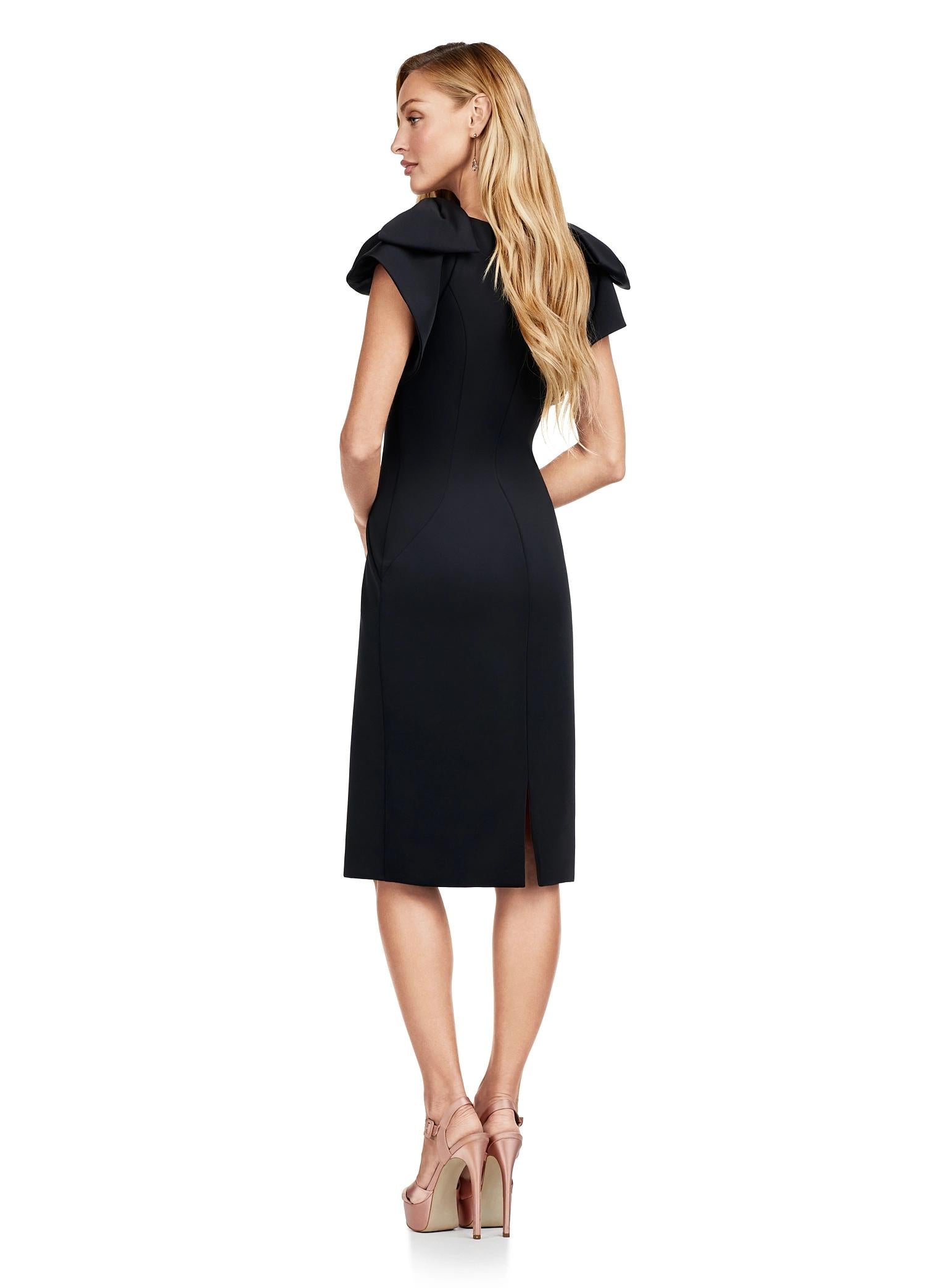 Back - Black ASHLEYlauren 4656 – A chic scuba cocktail dress featuring a deep illusion V-neckline, oversized bow details, and a fitted skirt for a flattering and stylish look. Perfect for any special occasion.