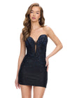 Black ASHLEYlauren 4689 strapless jersey cocktail dress featuring a fully beaded corset bustier, illusion V-neckline, fitted skirt, and press-on stone embellishments for a glamorous and sophisticated look.