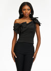 Black ASHLEYlauren 9001 elegant one shoulder bustier featuring asymmetrical ruching and delicate bow accents, perfect for styling with jeans or for pageant headshots.