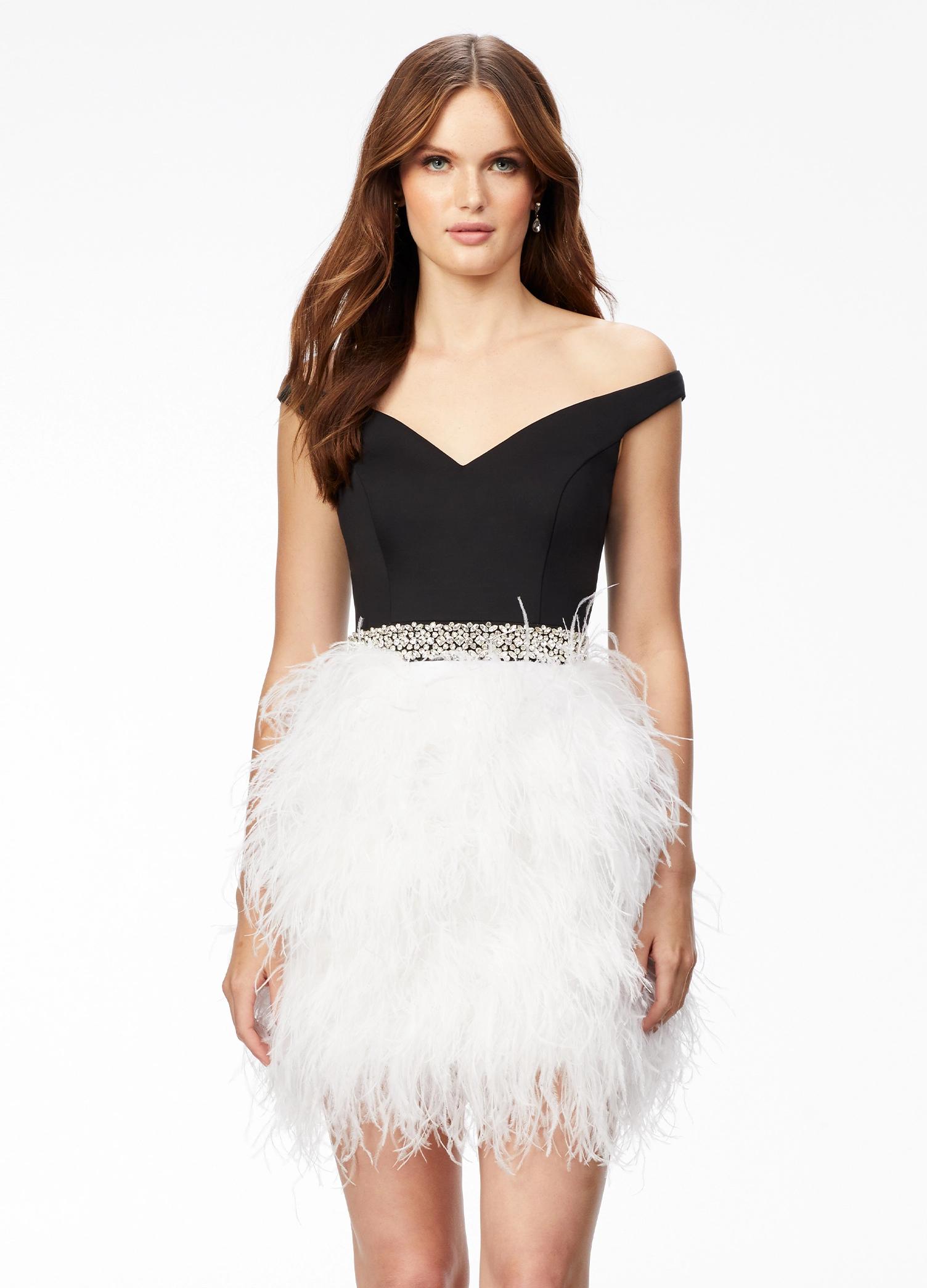 Black/White ASHLEYlauren 4536 off shoulder cocktail dress featuring a sweetheart neckline, crystal-encrusted belt, and a fitted fully feather skirt for a glamorous and elegant look.