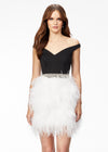 Black/White ASHLEYlauren 4536 off shoulder cocktail dress featuring a sweetheart neckline, crystal-encrusted belt, and a fitted fully feather skirt for a glamorous and elegant look.