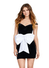 Black/White ASHLEYlauren 4643 off shoulder velvet cocktail dress featuring a fitted skirt, satin belt, and oversized bow detail for a chic and elegant look.