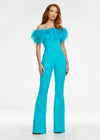 ASHLEYlauren 11100 – A flirty off-shoulder scuba jumpsuit featuring feather details along the neckline and flare pant legs. Perfect for making a stylish statement at your next event.