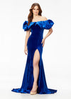 Blue ASHLEYlauren 11217 – A magnificent off-shoulder velvet gown featuring oversized ruffle details, a contour seamed skirt with a left leg slit, and a dramatic train. Perfect for making a bold, elegant statement at any event.