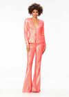 Coral ASHLEYlauren 11223 – A stunning two-piece suit featuring a plunging sequin V-neckline blazer paired with fit & flare style pants. Perfect for making a bold, fashion-forward statement at your next event.