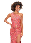 Coral ASHLEYlauren 11244 – A stunning one-shoulder gown featuring intricate beadwork that accentuates your curves, a left leg slit, and a signature asymmetrical lace-up back. Perfect for making a show-stopping statement at any event.