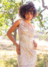 Editorial. Nude ASHLEYlauren 11207 One-Shoulder Sequin Gown with Asymmetrical Wrap Bead Pattern, Illusion Cut-Out, Slit, and Sweep Train