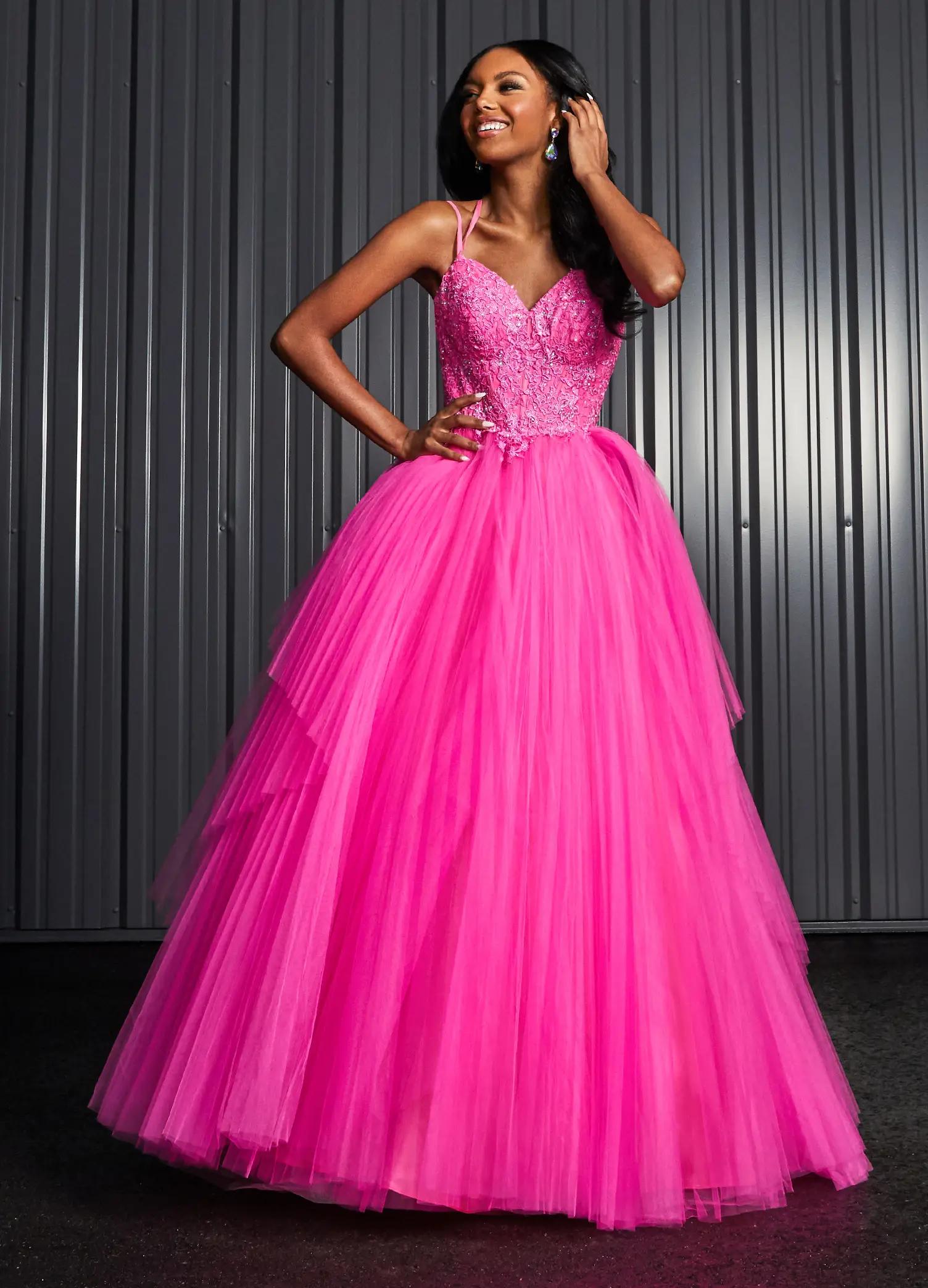 Editorial. Pink ASHLEYlauren 11146 Pleated Tulle Ball Gown with Spaghetti Straps, Embroidered Lace Bustier, Heat Set Stones, and Lace-Up Back