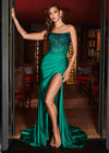 Emerald ASHLEYlauren 11690 Glamorous Strapless Gown with Exposed Corset Boning Encrusted in Press On Stones, Ruched Skirt, and Left Leg Slit